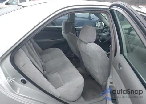 2003 Toyota Camry Le from USA, damaged, VIN 4T1BE32KX3U180610